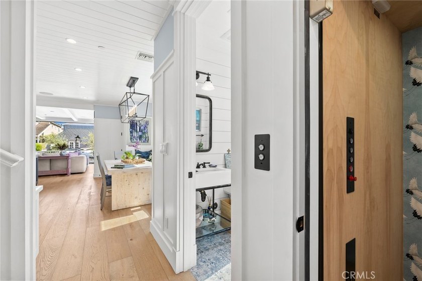 Indulge in luxurious coastal living with this fully furnished - photo 11
