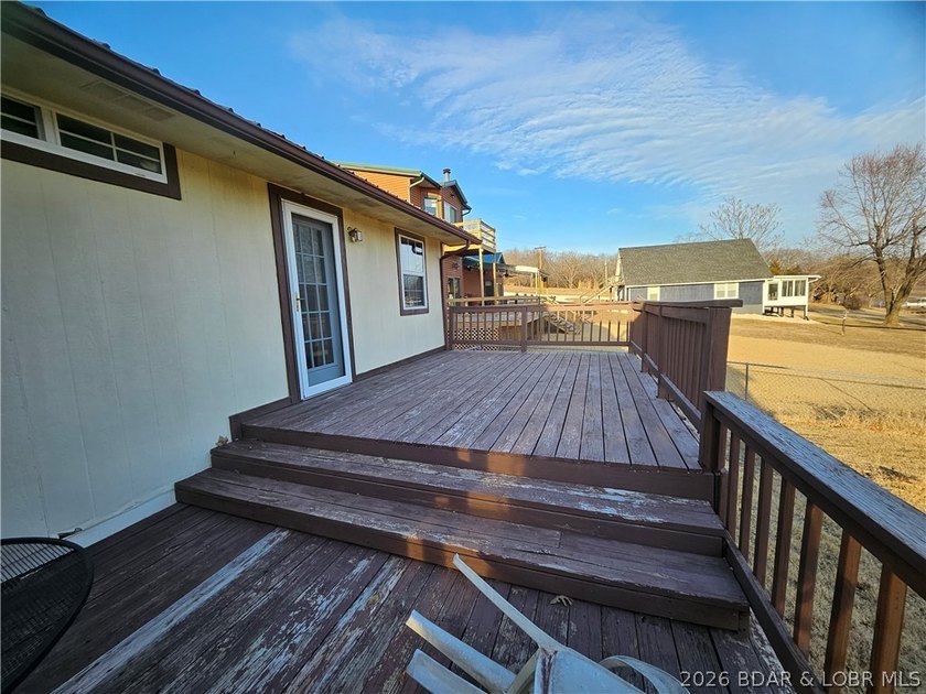 This lakefront homes has many pluses: one level living, attached - photo 12