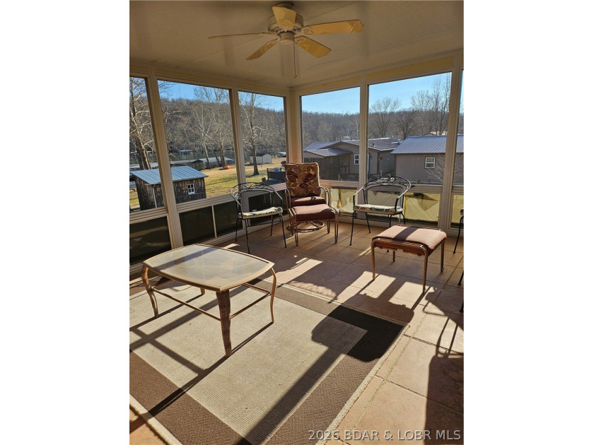 This lakefront homes has many pluses: one level living, attached - photo 13