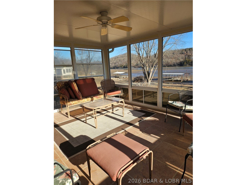 This lakefront homes has many pluses: one level living, attached - photo 14