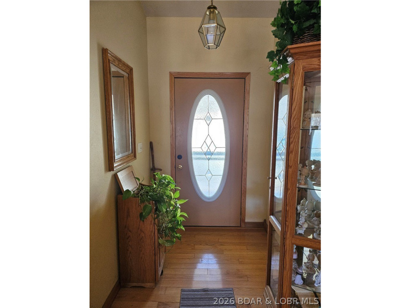This lakefront homes has many pluses: one level living, attached - photo 15