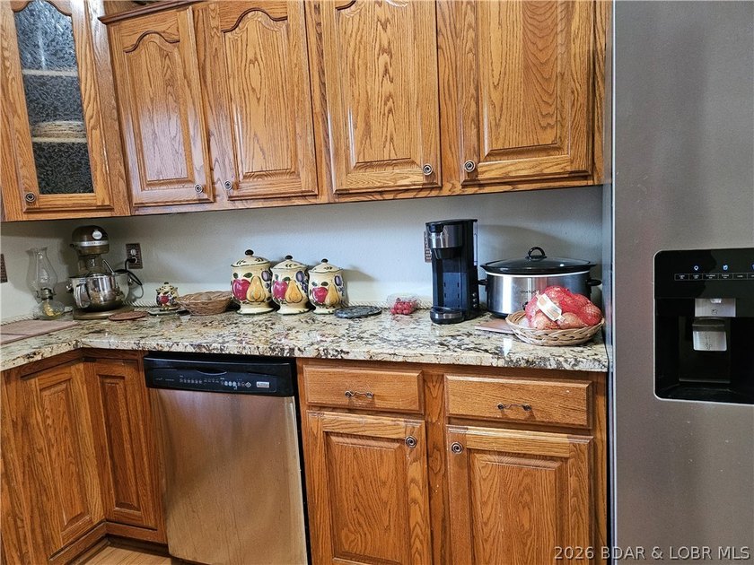 This lakefront homes has many pluses: one level living, attached - photo 22