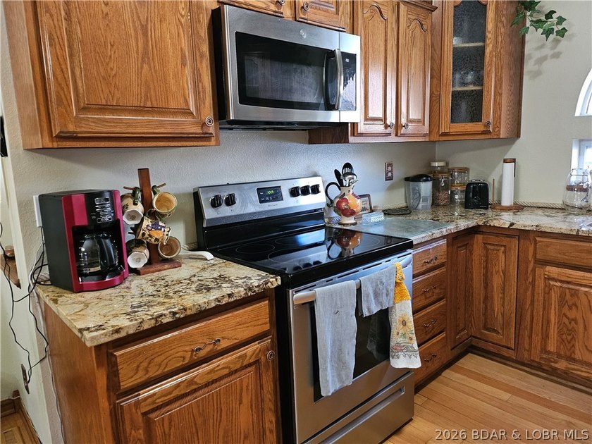 This lakefront homes has many pluses: one level living, attached - photo 23