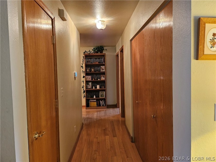 This lakefront homes has many pluses: one level living, attached - photo 25