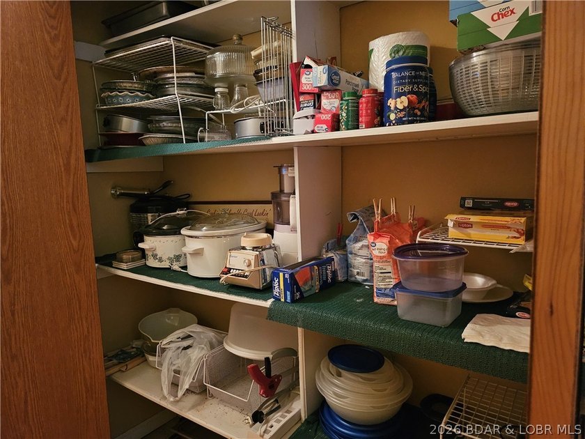 This lakefront homes has many pluses: one level living, attached - photo 26