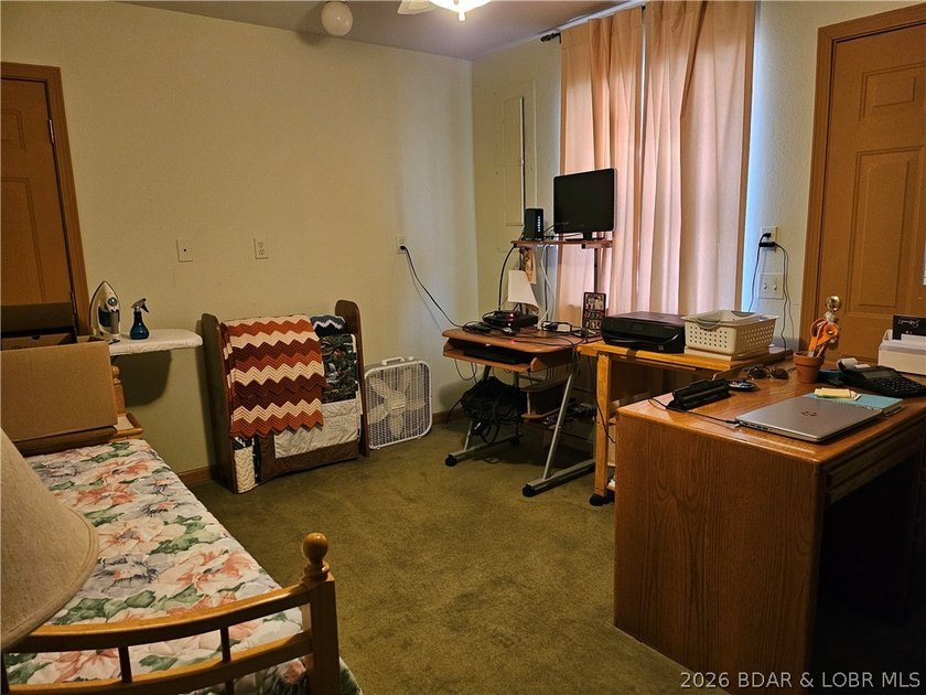 This lakefront homes has many pluses: one level living, attached - photo 41
