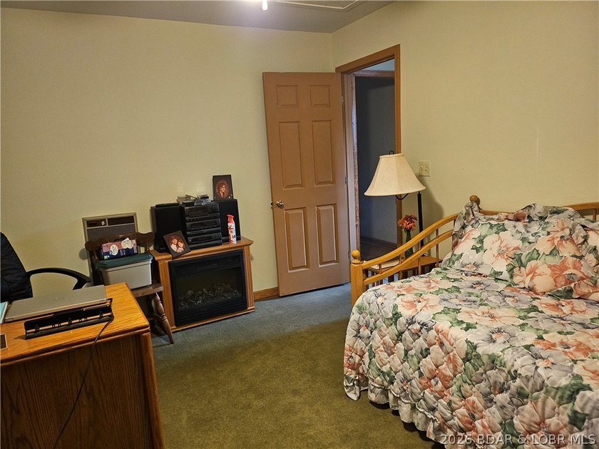 This lakefront homes has many pluses: one level living, attached - photo 44
