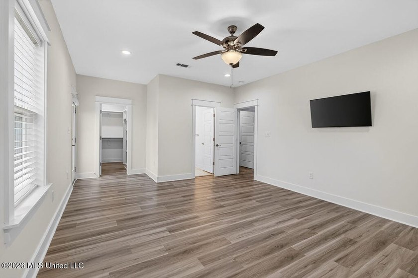 Enjoy living in the heart of Downtown Pass Christian. This - photo 17