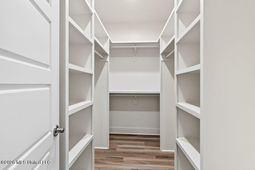 Enjoy living in the heart of Downtown Pass Christian. This - photo 21