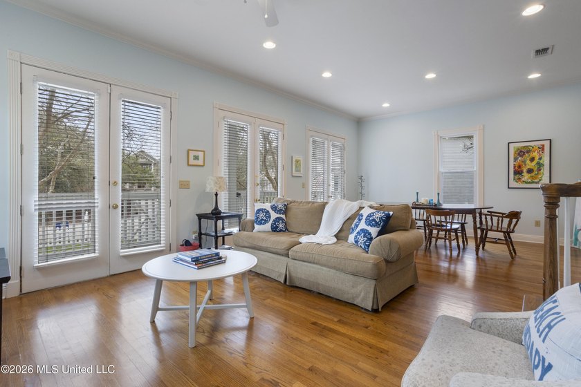 This two-story Coastal Southern Style home is nestled in a - photo 6