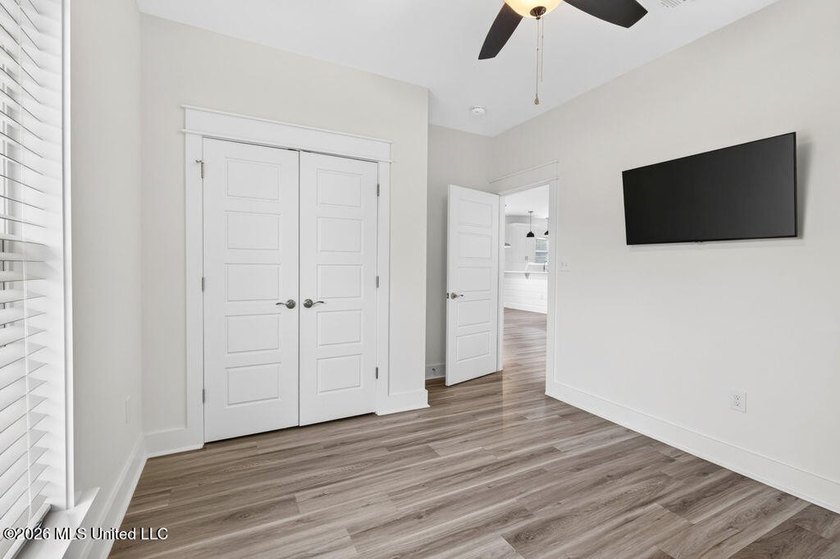 Enjoy living in the heart of Downtown Pass Christian. This - photo 26