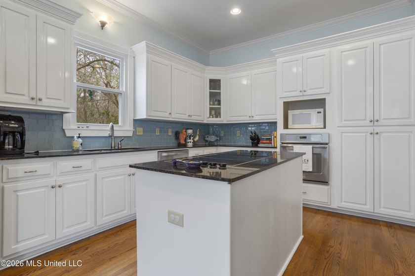 This two-story Coastal Southern Style home is nestled in a - photo 10