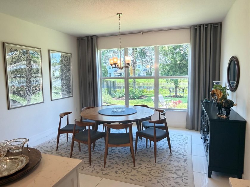 Welcome to this exceptional two-story residence, nestled within - photo 12