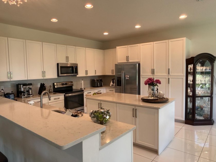 Welcome to this exceptional two-story residence, nestled within - photo 15