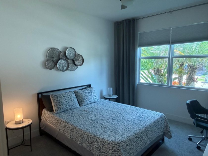 Welcome to this exceptional two-story residence, nestled within - photo 18