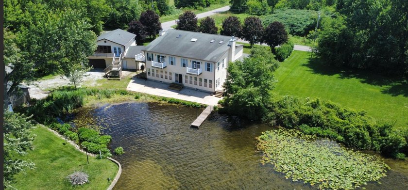 Stunning Lakefront Living with Incredible Income Potential! - photo 5