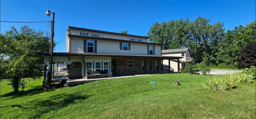 Stunning Lakefront Living with Incredible Income Potential! - photo 7