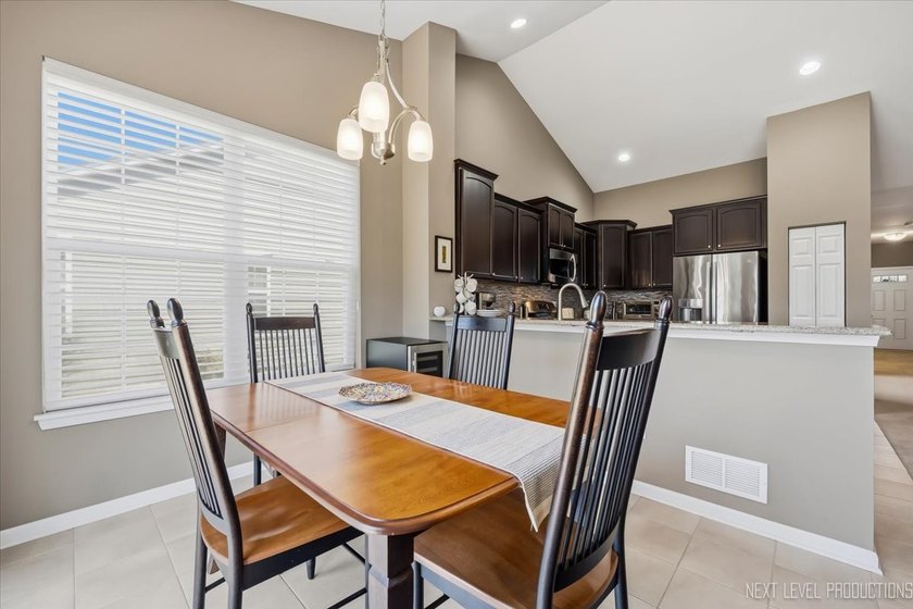 Enjoy carefree, low-maintenance living in this meticulously - photo 12