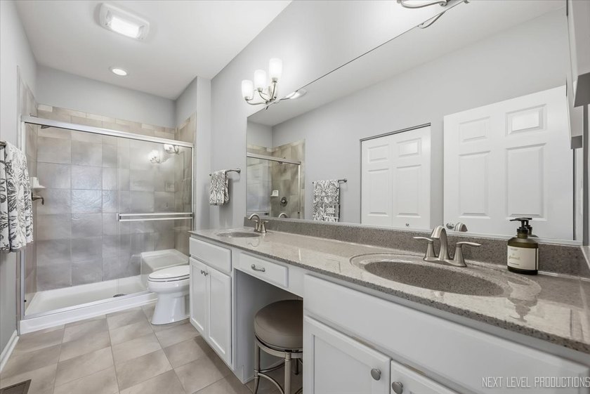 Enjoy carefree, low-maintenance living in this meticulously - photo 17