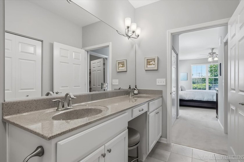 Enjoy carefree, low-maintenance living in this meticulously - photo 18