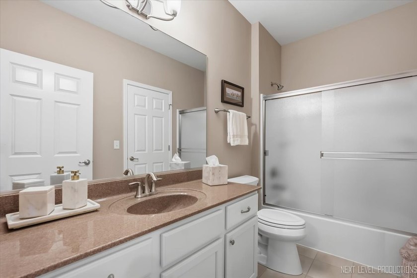 Enjoy carefree, low-maintenance living in this meticulously - photo 22