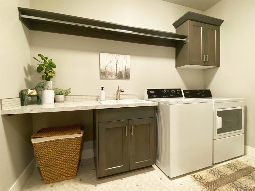 You must see this turnkey, single-level modern farmhouse! The - photo 21