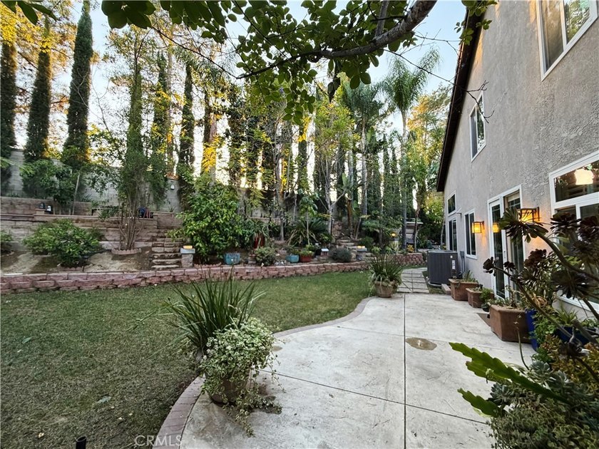 Welcome to this elegant two-story residence in the prestigious - photo 50