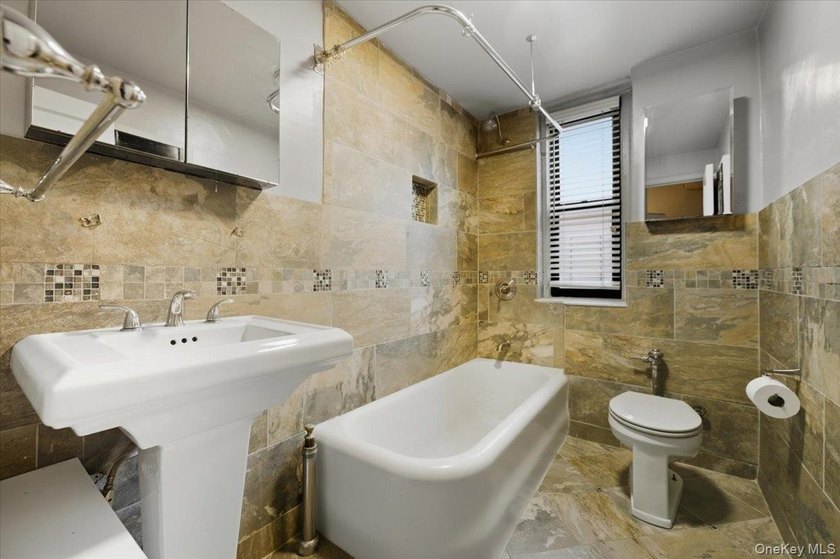 Classic Pre-War Charm Meets Modern Living at 3875 Waldo Avenue - photo 15