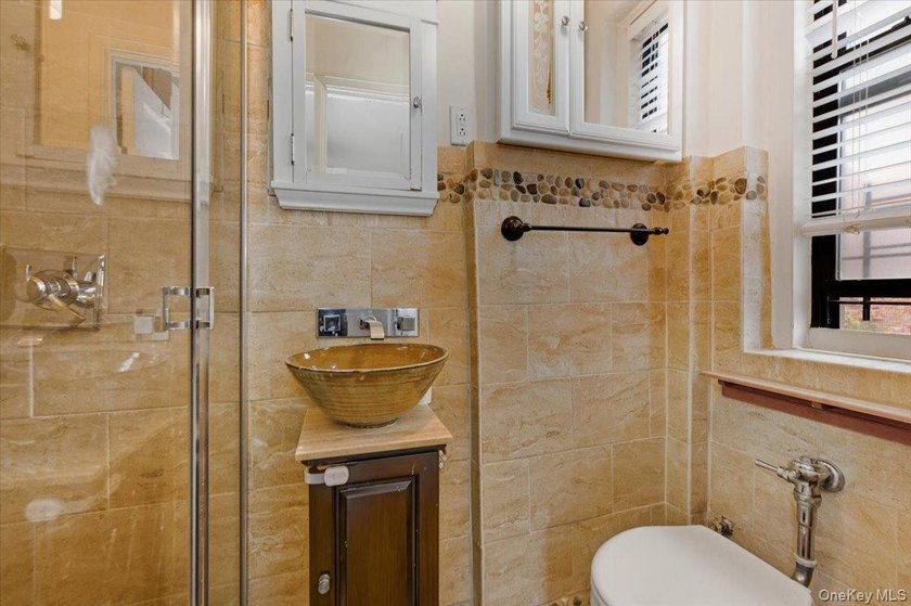Classic Pre-War Charm Meets Modern Living at 3875 Waldo Avenue - photo 16