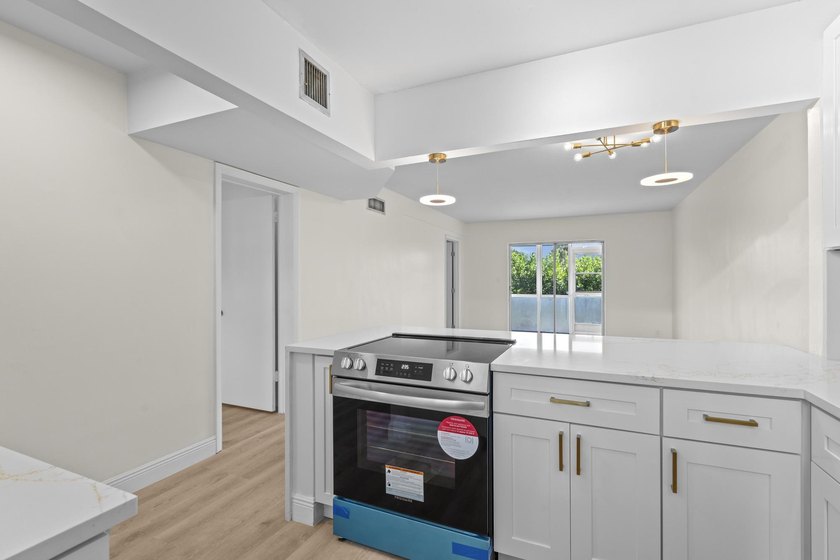 Welcome to this beautifully remodeled 2bed/1bath first floor - photo 5