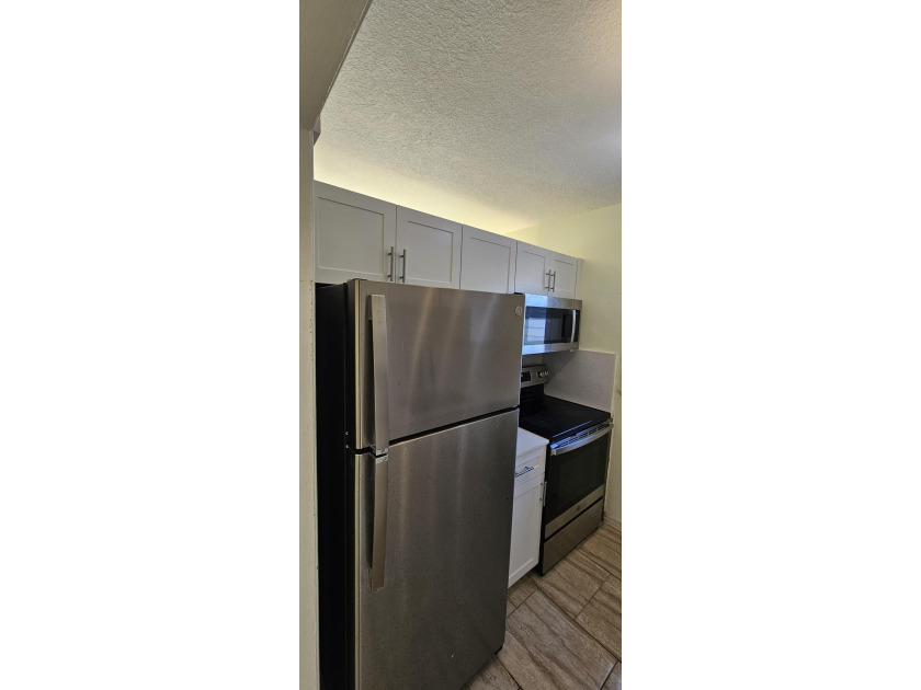 Bright Corner Unit in Golden Towers - 55+ Community. This - photo 29