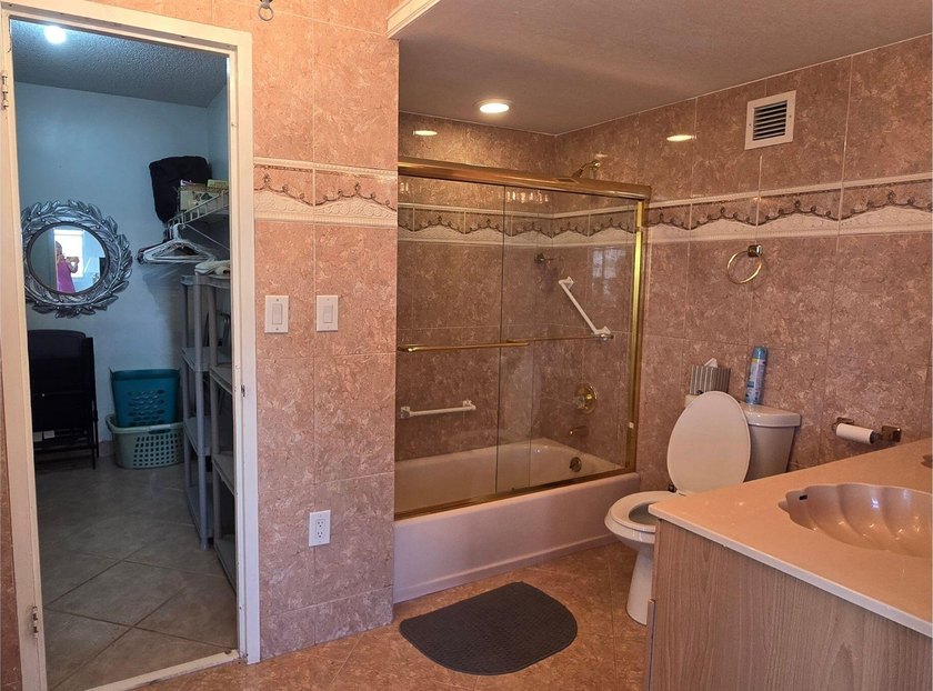Live on the sand in this pristine oceanfront property featuring - photo 15