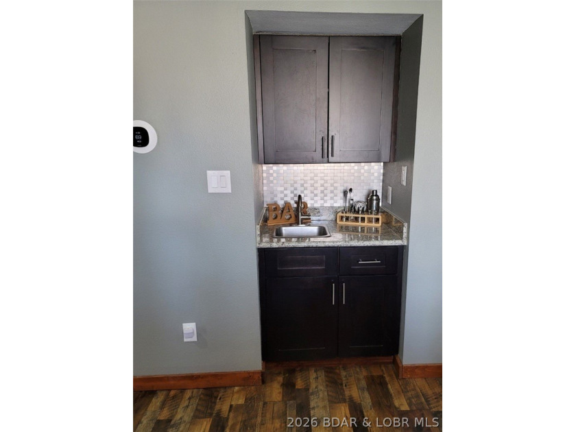 This ground-floor, 1-story, end unit offers plenty of room for - photo 13