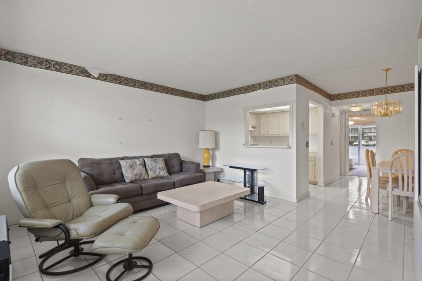 Welcome to this well-maintained 1-bedroom, 1-bath FIRST FLOOR - photo 2