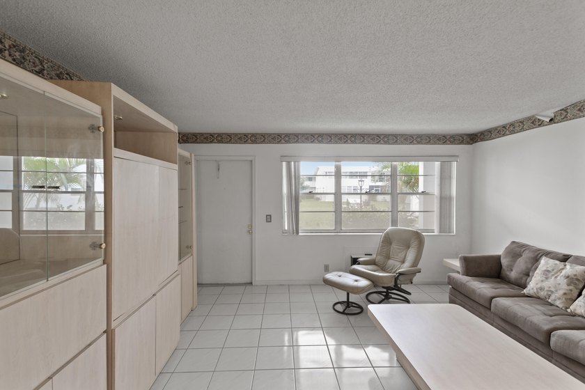 Welcome to this well-maintained 1-bedroom, 1-bath FIRST FLOOR - photo 3