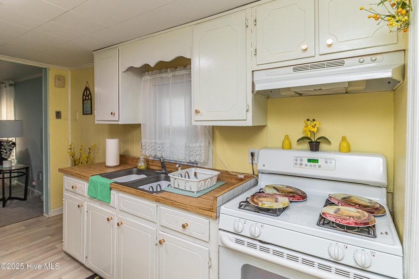 This charming 2-bedroom, 1-bath home blends modern updates with - photo 11