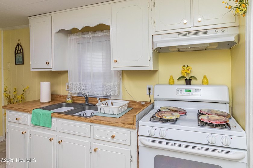 This charming 2-bedroom, 1-bath home blends modern updates with - photo 12