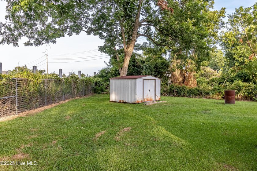 This charming 2-bedroom, 1-bath home blends modern updates with - photo 23