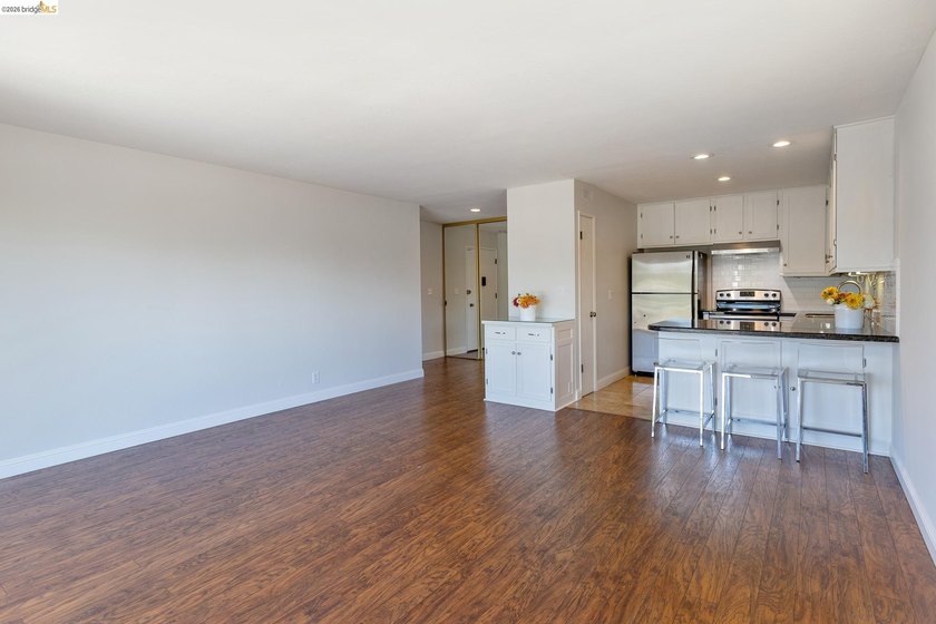 Welcome to this inviting third-floor corner unit featuring 2 - photo 2