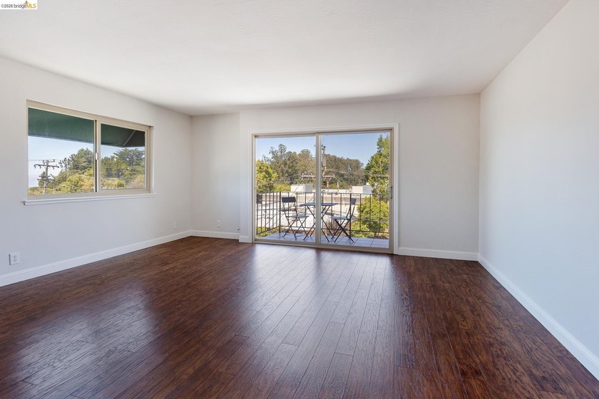 Welcome to this inviting third-floor corner unit featuring 2 - photo 3
