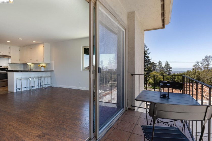 Welcome to this inviting third-floor corner unit featuring 2 - photo 5