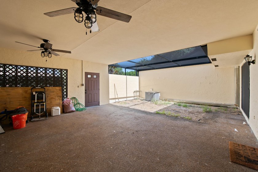 Welcome to this charming two-bedroom, two-bathroom villa in - photo 5