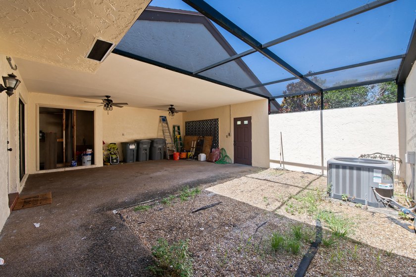 Welcome to this charming two-bedroom, two-bathroom villa in - photo 6