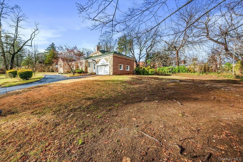 Welcome to this Sprawling Ranch in the Prestigious Village of - photo 29
