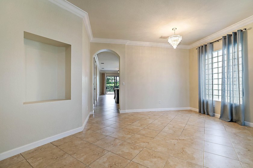 Located in the desirable gated community of Gulfstream Preserve - photo 4