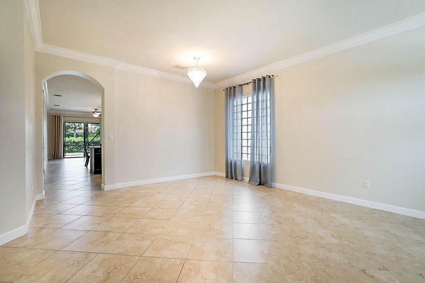 Located in the desirable gated community of Gulfstream Preserve - photo 6