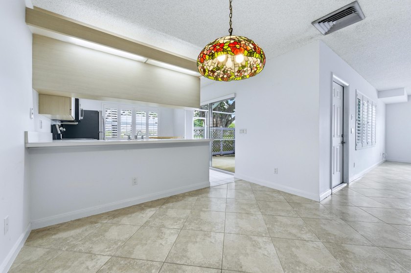 Welcome to this lovingly cared for waterfront townhome centrally - photo 9