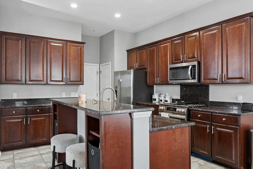 Stunning and spacious, this expansive end-unit residence offers - photo 12