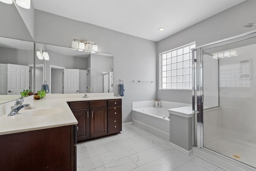 Stunning and spacious, this expansive end-unit residence offers - photo 25