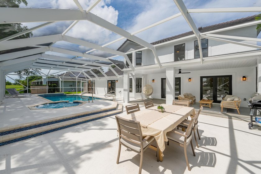 Welcome to this exceptional luxury pool estate in one of - photo 2